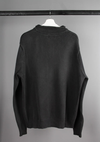 Achterkant van een zwarte Ralph Lauren quarter-zip sweater met een klassieke pasvorm en zachte katoenmix.